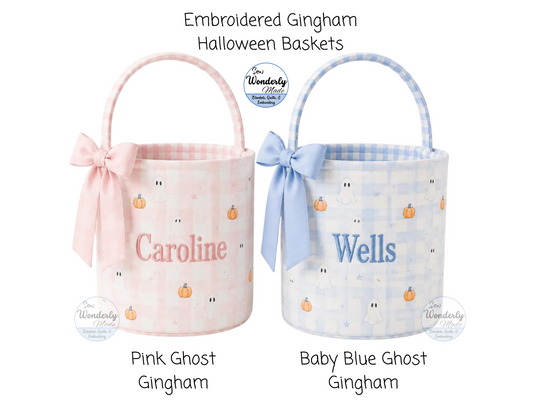 Two Gingham Halloween baskets, one pink and one baby blue, with embroidered names on a white background.