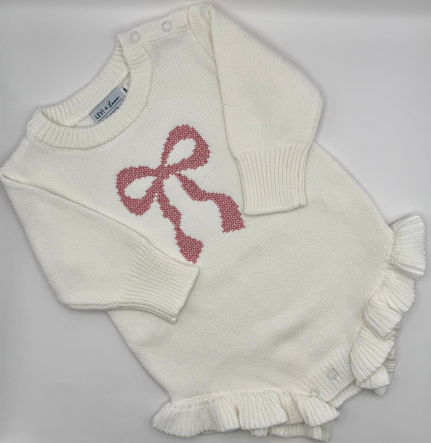 White Ruffle Romper - Cross-Stitch Bow